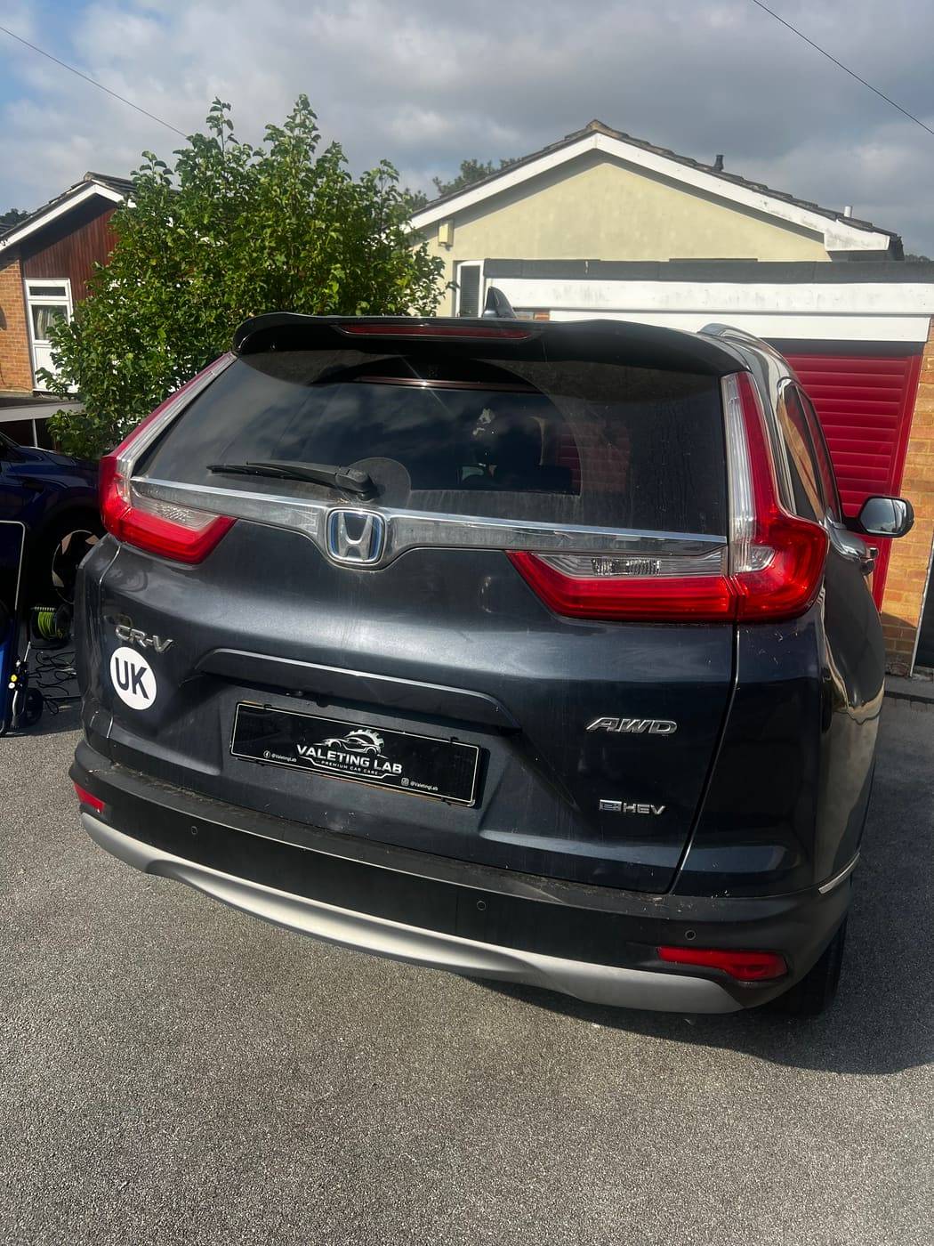 Honda CR V rear before valeting, dull and dusty paintwork