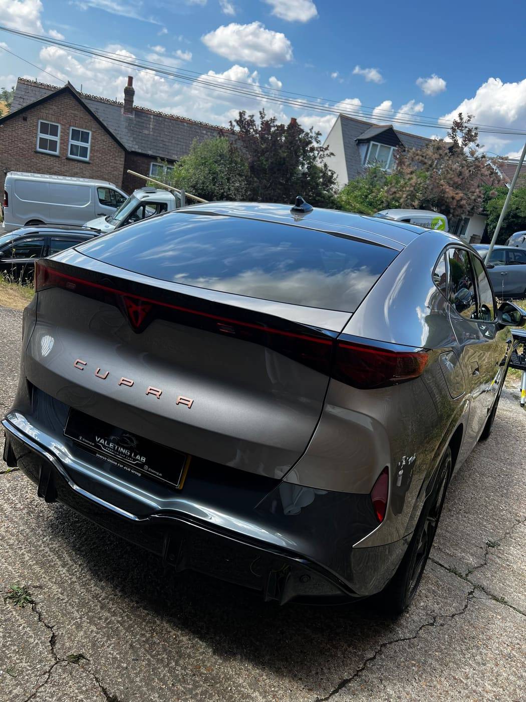 Cupra rear after valeting, sharp reflections across the paintwork