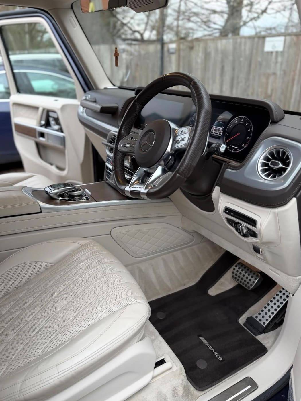G Wagon cream leather interior after cleaning, footwell and mats fresh