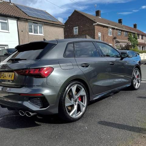 Freshly valeted grey Audi S3 on a residential driveway