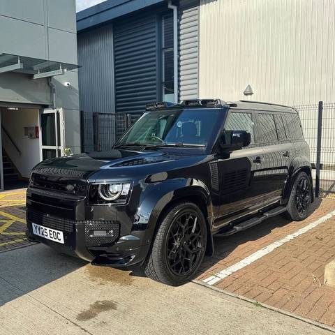 Black Land Rover Defender after a full valet